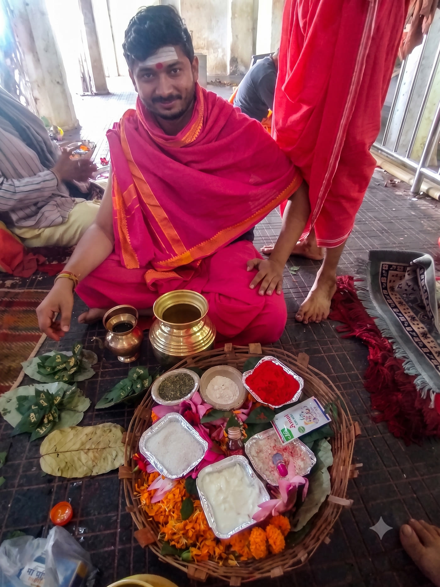 Our pujari with the full samagri basket at Baidyanathdham