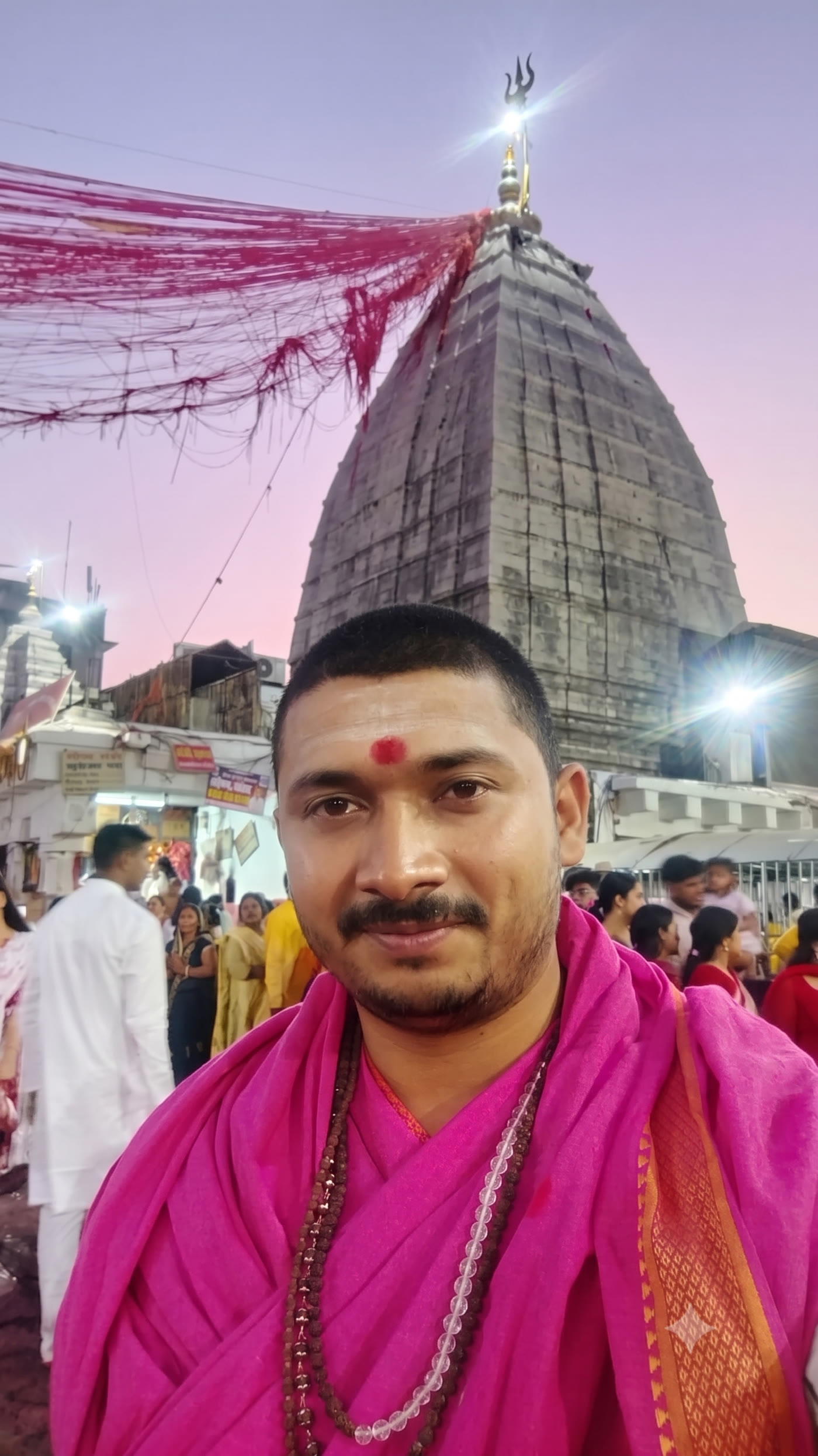 Pujari before the Baidyanath temple shikhara