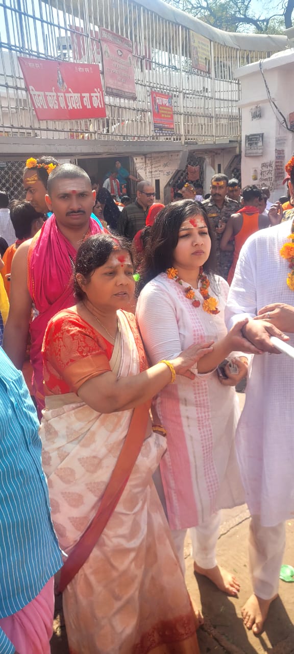 Devotee family at the temple after puja